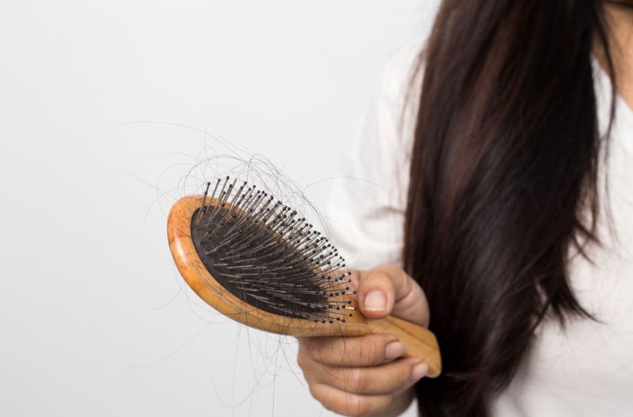 How Stress Is Impacting Your Hair And What To Do About It