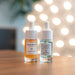 Graydon Moon Boost Serum and Fullmoon Serum in front of holiday lights